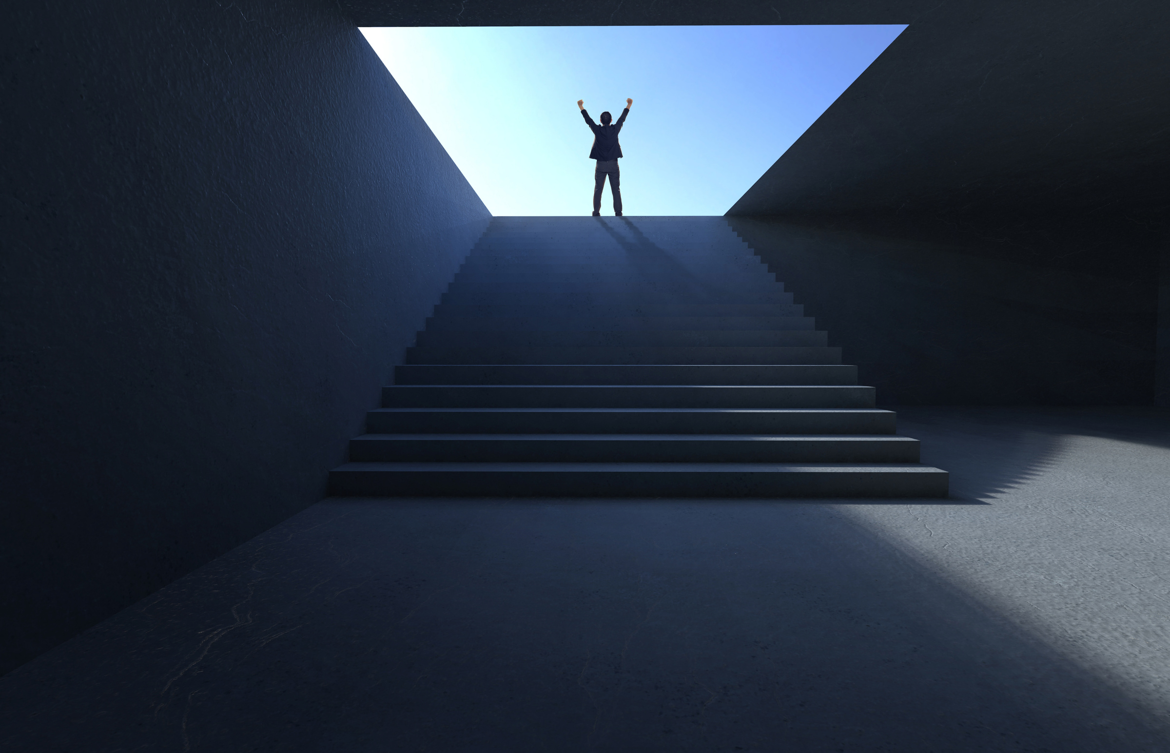 Successful businessman climbing on stair